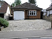 PAVED FRONT GARDEN WITHOUT PLANTS