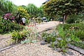 A GRAVEL GARDEN WITH SEATING AREA