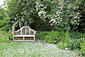 A LUTYENS SEAT AT NARBOROUGH HALL GARDENS