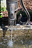 OLD FASHIONED WATER PUMP AS WATER FEATURE