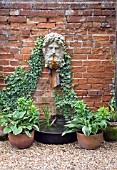 SMALL WATER FEATURE IN WALLED GARDEN