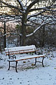 BENCH IN WINTER SNOW.