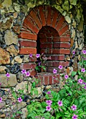 ARCH WINDOW IN A FLINT WALL