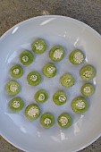 GARLIC SCAPES ON A PLATE, HARDNECK GARLIC