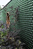 WALL OF GREEN WINE BOTTLES