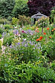 GERANIUM,  PAPAVER ORIENTALE,  ROSA, PAEONIA, DIGITALIS, WITH GARDEN PAVILION. DESIGN: MARIANNE AND DETLEF LUEDKE