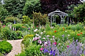 NEPETA, IRIS, PAEONIA, PAPAVER ORIENTALE, WITH GARDEN PAVILION. DESIGN: MARIANNE AND DETLEF LUEDKE