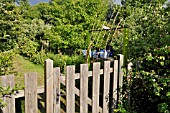 WOODEN GATE OF A NATURAL GARDEN