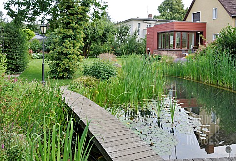 SWIMMING_POND_WITH_WOODEN_DECKING_AREA