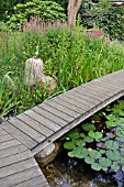 SWIMMING POND WITH WOODEN DECKING AREA