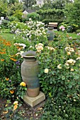 ROSE GARDEN WITH CERAMIC VASES