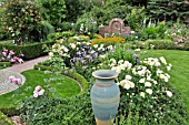 ROSE GARDEN WITH CERAMIC VASE