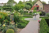 ROSE GARDEN WITH GRANITE FOUNTAIN AND CERAMIC VASE