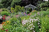 RICH FLOWERING GARDEN WITH PAVILION. DESIGN: MARIANNE AND DETLEF LUEDKE