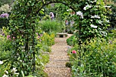 ROSE ARCH WITH CLEMATIS  CLEMATIS. DESIGN: MARIANNE AND DETLEF LUEDKE