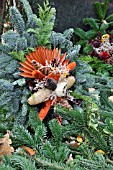 GRAVE DECORATION WITH FIR BRANCHES