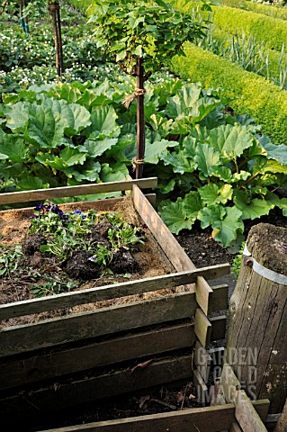 WOODEN_COMPOST_BIN_IN_AN_ALLOTMENT_GARDEN