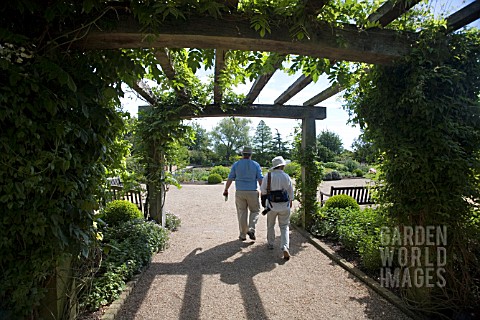 THE_ENTRANCE_TO_THE_GARDENS_AT_RHS_GARDEN__HYDE_HALL__IS_THROUGH_THIS_ARCH_OF_CLEMATIS_AND_WISTERIA
