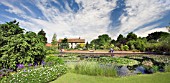 RHS HYDE HALL,  VIEW OF GARDEN TOWARD HOUSE