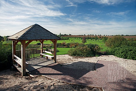 ONE_OF_THE__PERGODAS_AND_A_VIEW_OF_PART_OF_THE_GARDEN_AT_HYDE_HALL__NEAR_CHELMSFORD