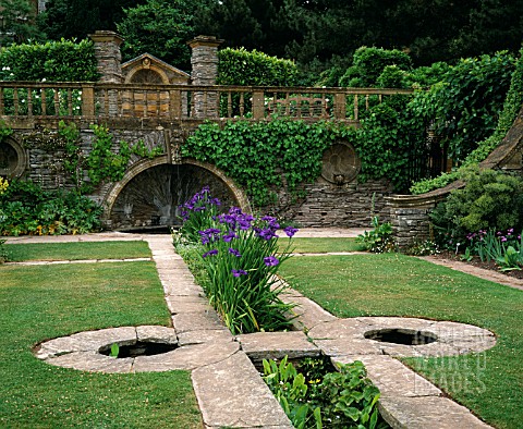 THE_EAST_RILL_WITH_IRIS_ENSATA_AT_HESTERCOMBE_GARDENS__EDWIN_LUTYENS