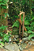 DEER SCARER IN JAPANESE GARDEN AT STAPEHILL ABBEY,  SEPTEMBER