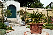 VIEW OF THE WALLED GARDEN AT LAMORRAN HOUSE GARDENS,  ST. MAWES,  CORNWALL: JULY