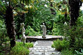 SCENE AT LAMORRAN HOUSE GARDENS,  ST. MAWES,  CORNWALL: JULY