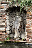 STATUARY AT LAMORRAN HOUSE GARDENS,  ST. MAWES,  CORNWALL: JULY