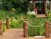 SCENE IN THE SUMMERTIME WATER GARDEN (WORLD OF WATER) AT THE HAMPTON COURT PALACE FLOWER SHOW,  JULY 2007.