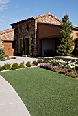 LANDSCAPED FRONT GARDEN WITH ARTIFICIAL TURF ON DEVELOPMENT AT LAKE LAS VEGAS RESORT, HENDERSON, NEVADA