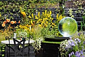 THE BENECOL PRISM GARDEN (SUPPORTING RAINBOW TRUST)  DEWDROPS BY NEIL WILKIN AT THE HAMPTON COURT PALACE FLOWER SHOW JULY 2008