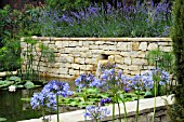 DORSET WATER GARDEN (ROMANTIC CHARM) AT THE HAMPTON COURT PALACE FLOWER SHOW JULY 2008