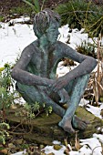 BRONZE STATUE IN THE SNOW