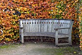 CURVED GARDEN SEAT IN AUTUMN