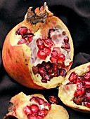 PUNICA GRANATUM,  POMEGRANATE,  CUT OPEN