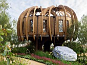 QUIET MARK TREEHOUSE AND GARDEN BY JOHN LEWIS DESIGNED BY DAVID DOMONEY