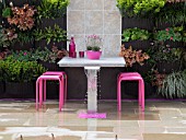 PINK TABLE AND CHAIRS IN THE BLUSH GARDEN AT RHS MALVERN FESTIVAL